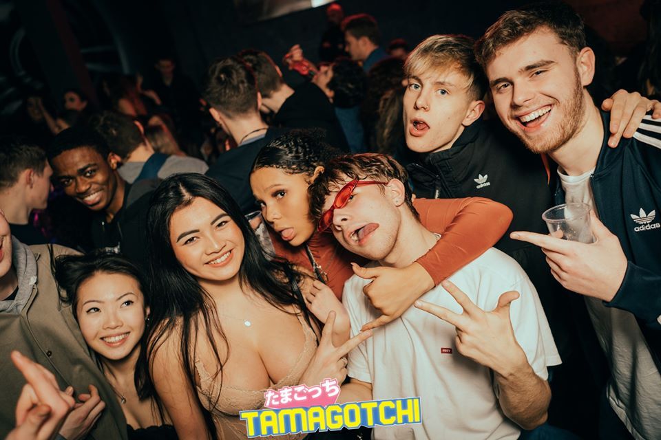 Image may contain: People, Night Life, Crowd, Audience, Night Club, Club, Party, Human, Person