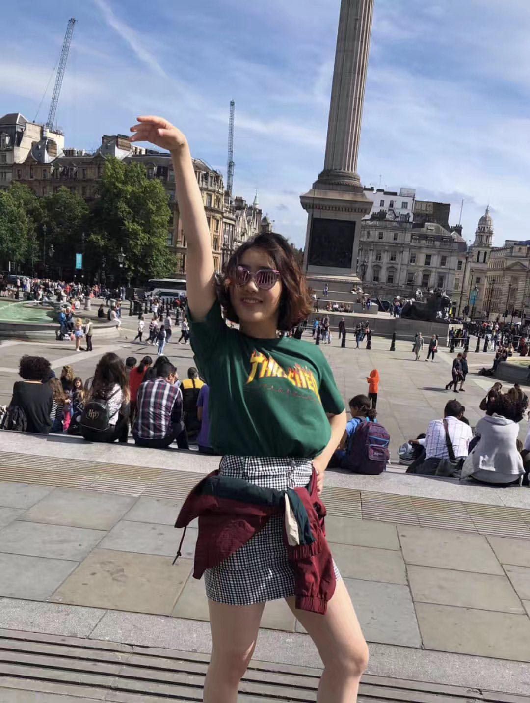 Image may contain: Photo, Face, Portrait, Photography, Skirt, Pillar, Column, Vacation, Woman, Female, Shorts, Sunglasses, Accessories, Accessory, Architecture, Human, Person, Clothing, Apparel, Urban, Building, City, Town, Downtown