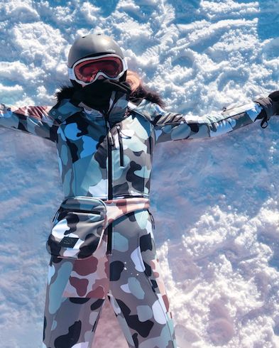 Image may contain: Sports, Sport, Mountain Range, Peak, Mountain, Snow, Apparel, Clothing, Helmet, Human, Person, Nature, Outdoors