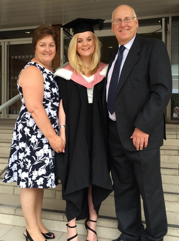 FILE PICTURE - Charlotte Foster with parents Stephen and Cecilia at her graduation. An inquest into the death of a 23-year-old woman who died in hospital after collapsing at work, takes place today at Shrewsbury Coroners Court. July 22, 2016. See NTI story NTIPILL. The hearing into the death of Charlotte Foster, from Newport, Shropshire, will examine whether or not the contraceptive pill played any part in her collapse from a pulmonary embolism in January. Charlotte Foster, from Newport, Shropshire, is believed to have taken Dianette, which had been prescribed by her GP, shortly before her sudden death. Miss Foster, a customer category executive at Muller who studied at the University of Liverpool, was described as 'intelligent, beautiful and caring' by her parents. The opening of an inquest into her death heard that she died at Princess Royal Hospital in Telford on January 25. In a statement, Charlotte's parents Stephen, 55, and Cecilia, 60, said they had been left heartbroken.