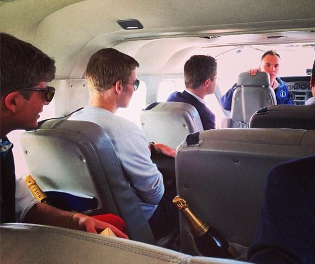 'Bullers' on a private jet, each seat has a personal bottle of Moet 