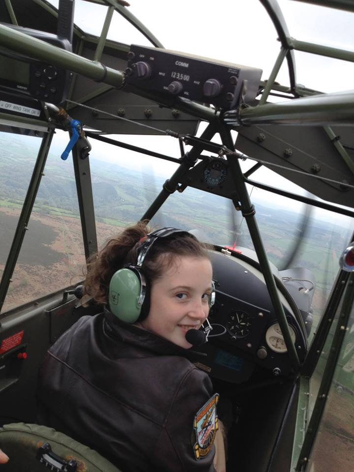 Ellie Carter during a flying leesson. See SWNS story SWGLIDER; FLYING solo has been the dream of a North Devon schoolgirl since she could talk and this week she did it, becoming the UK’s youngest female glider pilot. Ellie Carter, 14, of Torrington has been obsessed with flying for years and hit the headlines a few years ago after writing to the Royal International Air Tattoo, a special aerospace event held every year, to ask if her favourite plane, the U2 spy plane, would be there. Ellie’s first solo flight was on Monday, November 28, from North Hill Airfield near Honiton. The youngster, who attends South Molton Community College, is even more determined to achieve her dream job as a test pilot after Monday’s flight. She said: “I loved flying solo. I never get scared, I love being in control and it’s important to stay calm while flying, it’s safer. “I’ve always been obsessed with flying, the science behind it, and if I had been born earlier I think I would have been one of the first female aviators. “To be honest Monday felt like any other flight to me, it didn’t make much of a difference being on my own.” Her plea to see a U2 spy plane in 2012 was picked up by show chiefs at RAF Fairford who gave her the opportunity to sit in a chase car travelling at approximately 120mph as it attempted to keep up with a landing U-2 plane.