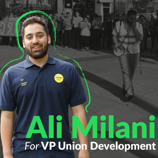 Ali Milani's campaign picture, showing him wearing a high vis and speaking into a megaphone