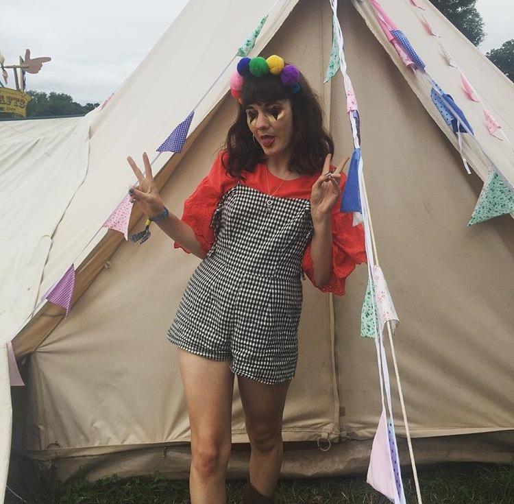 Cute clown vibes all round as Libby pairs a gingham playsuit with costume-like extras