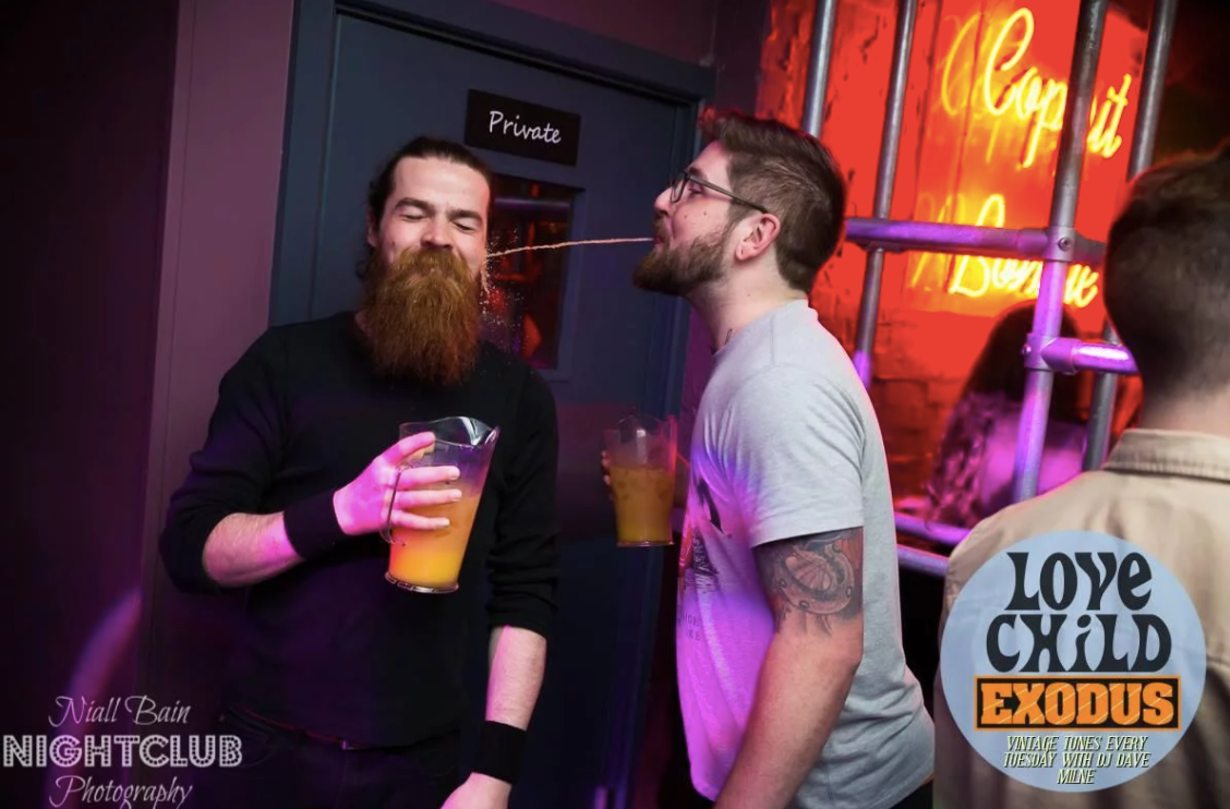 Image may contain: Drink, Beverage, Human, Hair, Beard, Person, People