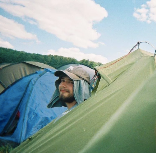 Image may contain: Hair, Beard, Tent, Human, Person, People, Camping