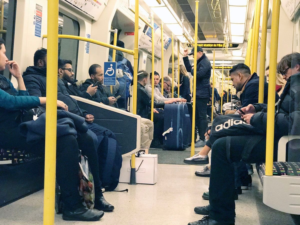 Image may contain: Asleep, Vehicle, Transportation, Train Station, Train, Terminal, Subway, Person, People, Human