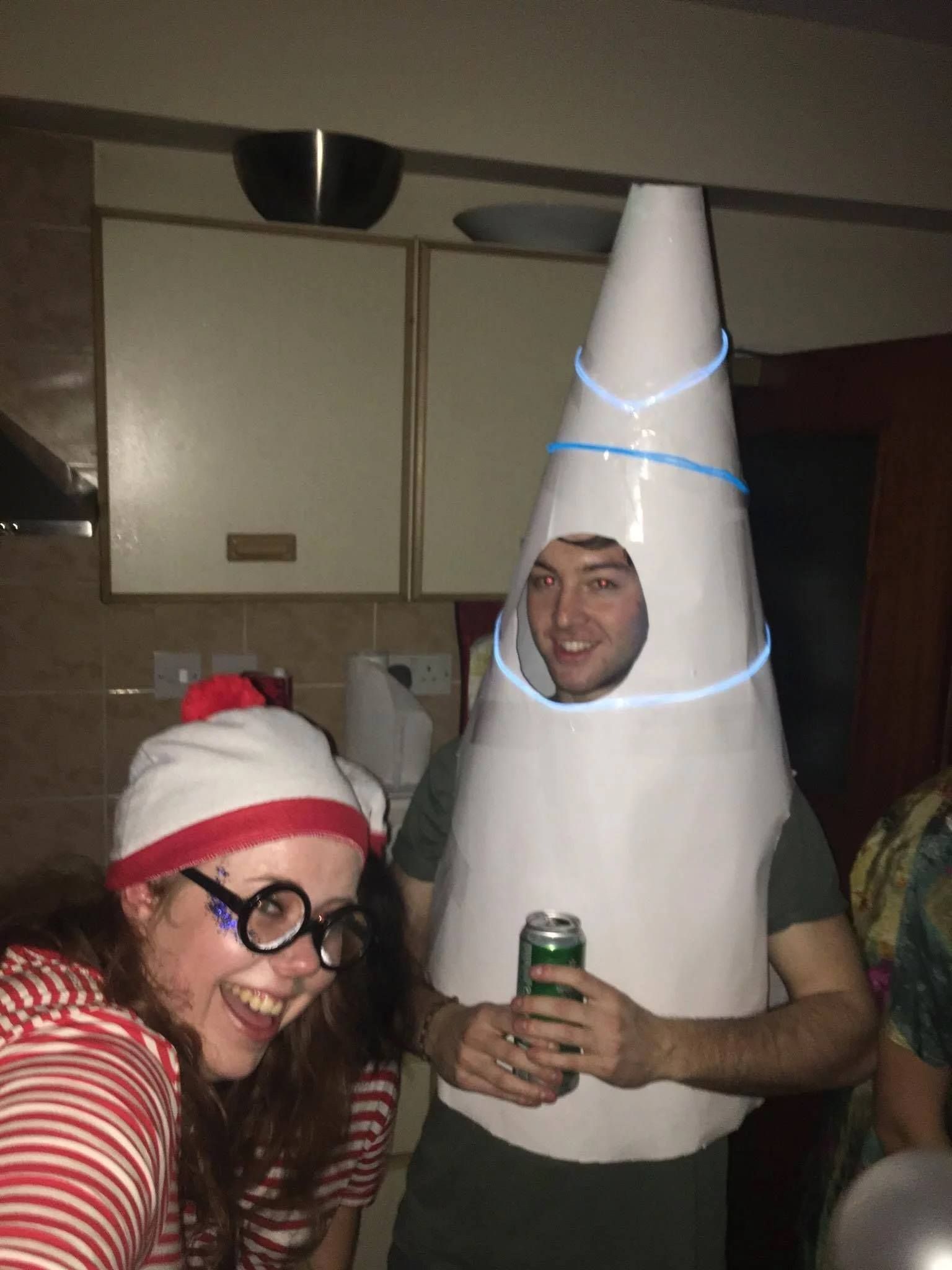 Image may contain: Hand, Finger, Portrait, Head, Party Hat, Hat, Human, Person, People