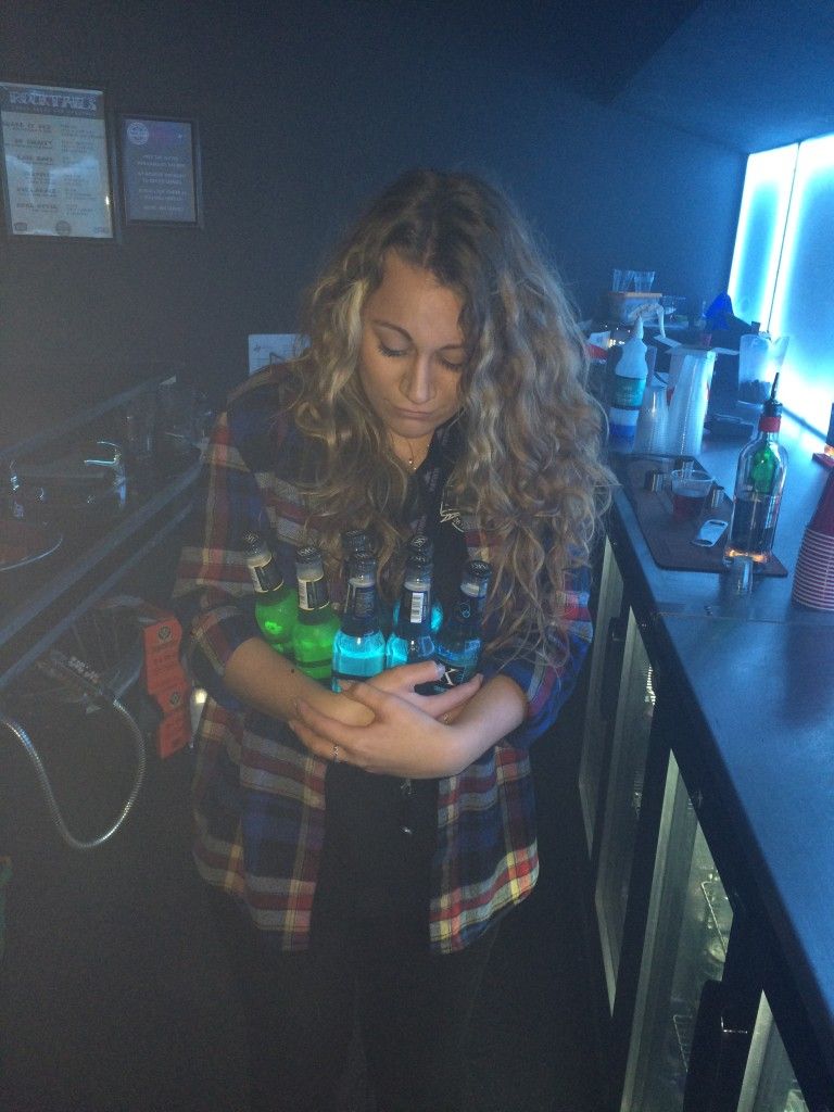 Image may contain: Night Life, Night Club, Club, Bottle, Human, Person, People