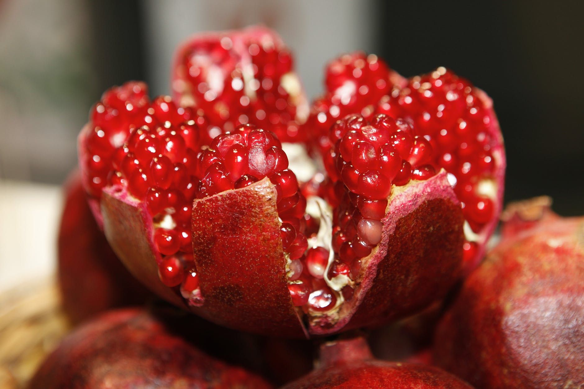 Image may contain: Pomegranate, Produce, Plant, Fruit, Food, Flora