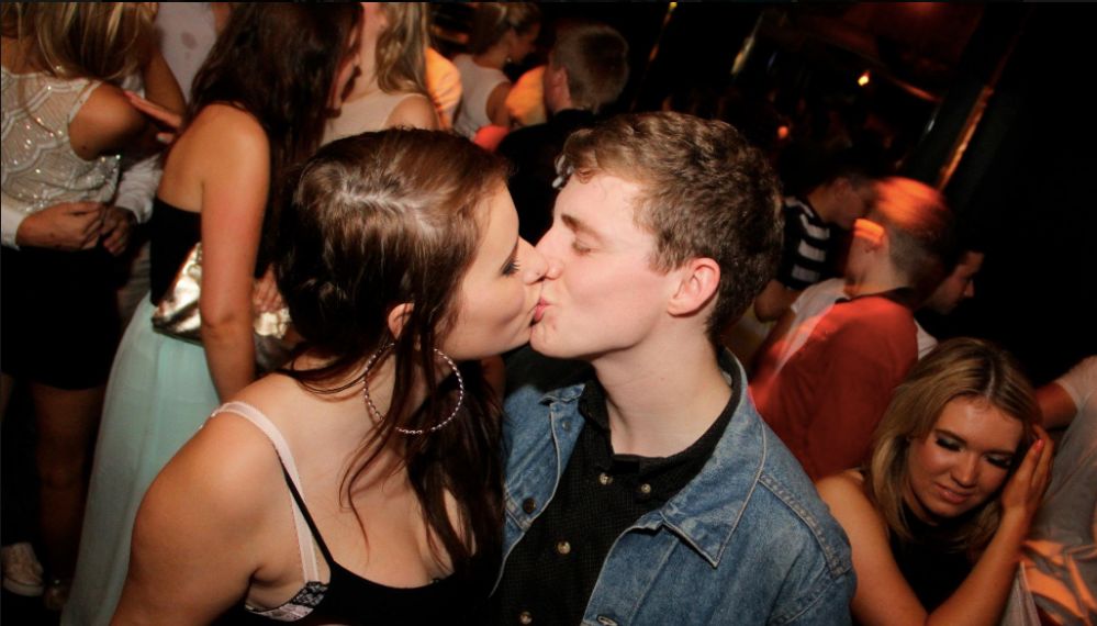 Image may contain: Crowd, Party, Make Out, Person, People, Human