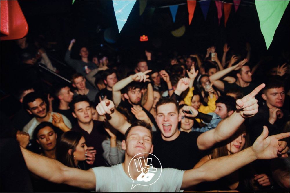 Image may contain: Night Life, Party, Crowd, Person, People, Human