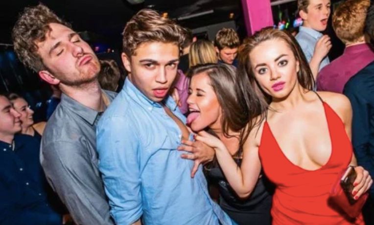 Image may contain: Party, Night Life, Night Club, Club, Person, People, Human