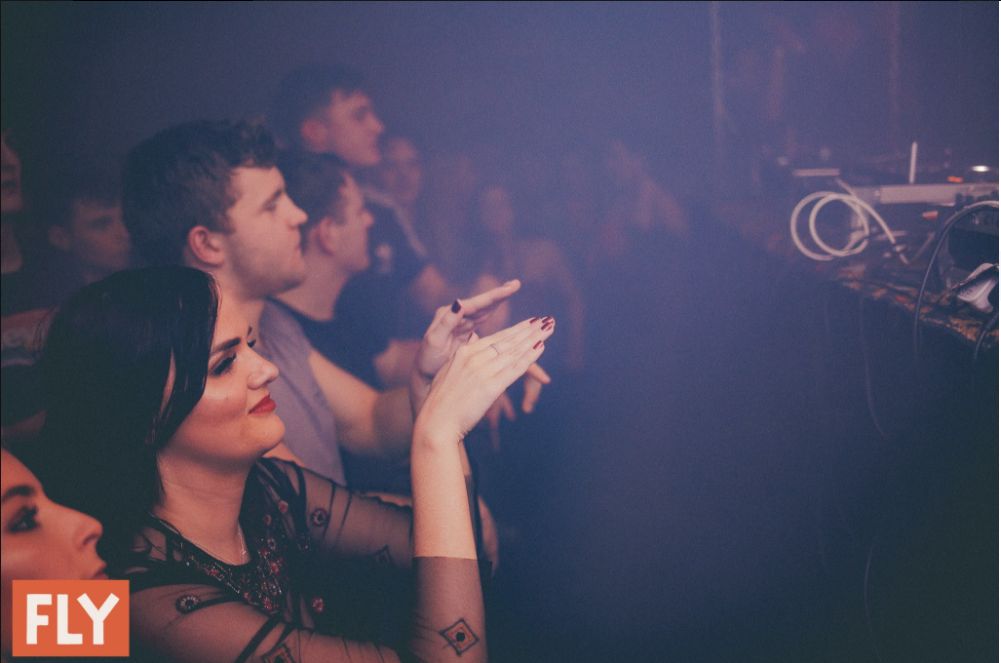 Image may contain: Poster, Night Life, Night Club, Club, Person, People, Human