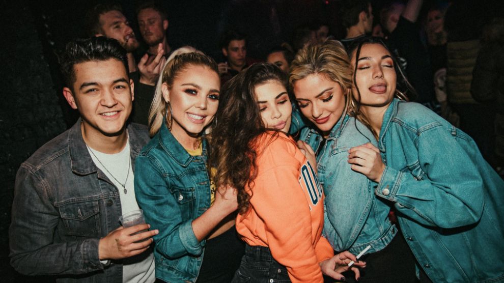 Image may contain: Crowd, Party, Furniture, Couch, Night Life, Night Club, Club, Person, People, Human