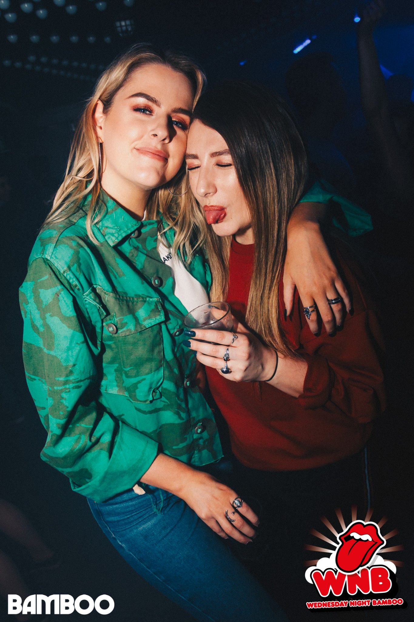 Image may contain: Trademark, Logo, Night Life, Night Club, Club, Person, People, Human