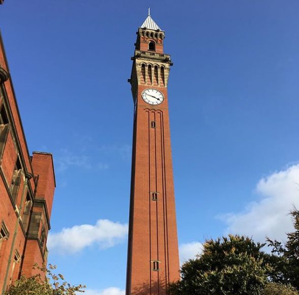 Image may contain: Clock Tower, Tower, Building, Architecture