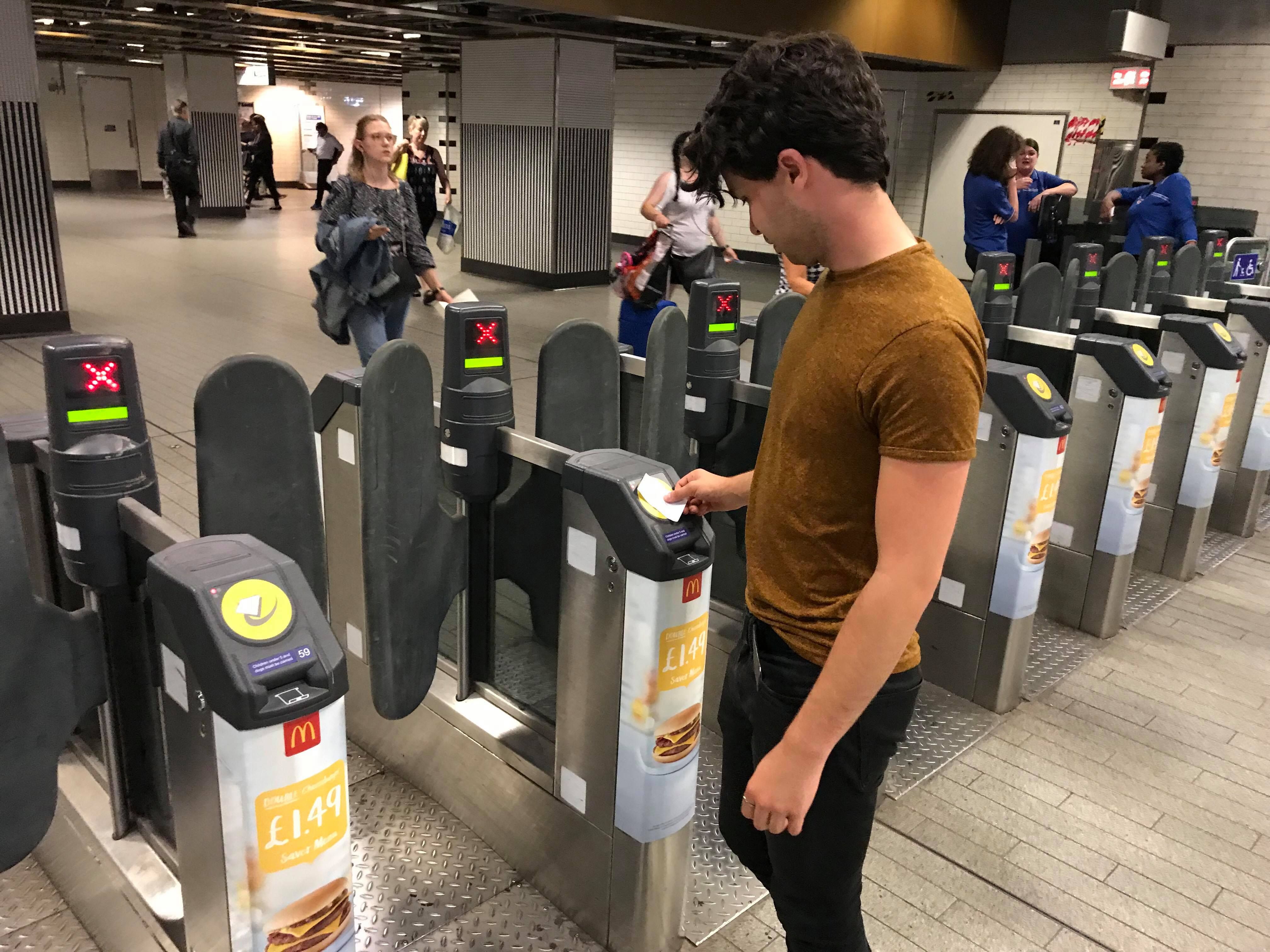 Image may contain: Drink, Beverage, Turnstile, Gate, Person, People, Human