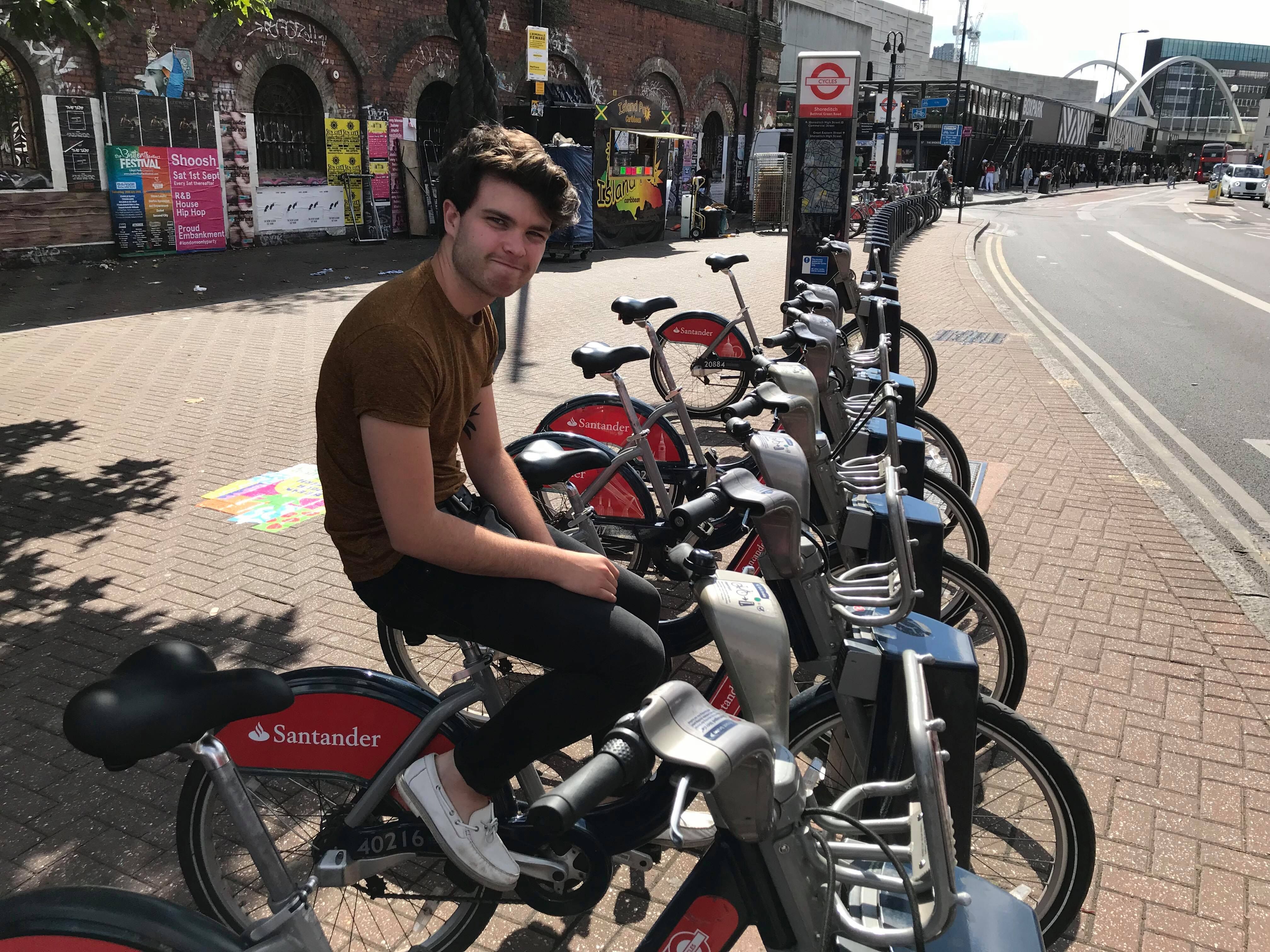 Image may contain: Road, Intersection, Bike, Bicycle, Vespa, Motor Scooter, Moped, Vehicle, Transportation, Motorcycle, Person, People, Human