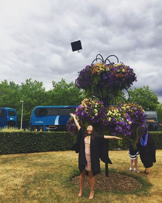 Image may contain: Vehicle, Transportation, Bus, Vase, Pottery, Potted Plant, Plant, Jar, Flora, Person, People, Human