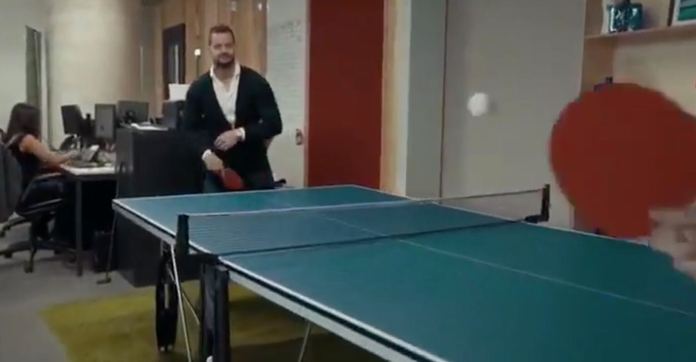 Image may contain: Worker, Office, Indoors, Sports, Sport, Ping Pong, Person, People, Human