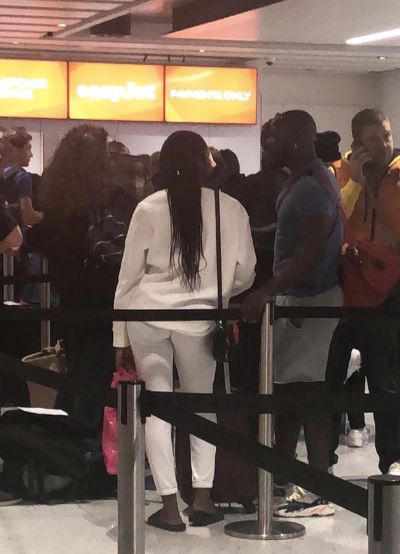 Image may contain: Airport, Crowd, People, Human, Person