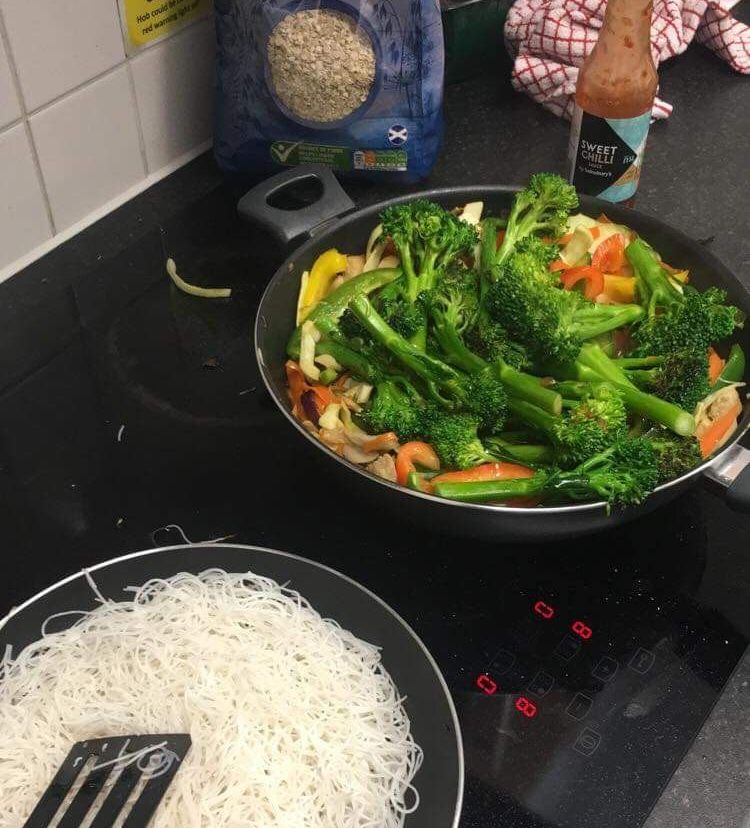 Image may contain: Appliance, Oven, Produce, Human, Person, Vegetable, Food, Broccoli, Plant