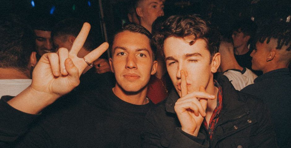 Image may contain: Head, Night Life, Finger, Face, Person, Human