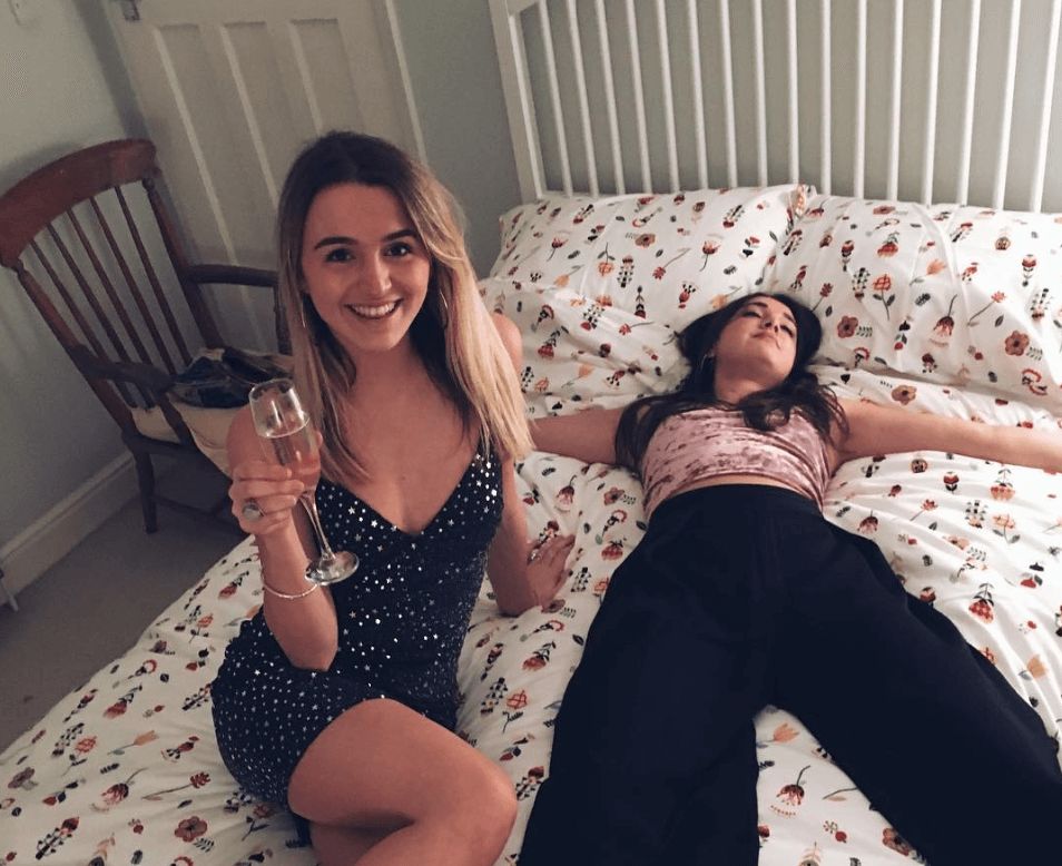 Image may contain: Portrait, Photography, Photo, Apparel, Clothing, Bedroom, Face, Room, Indoors, Couch, Bed, Cushion, Pillow, Chair, Person, Human, Furniture