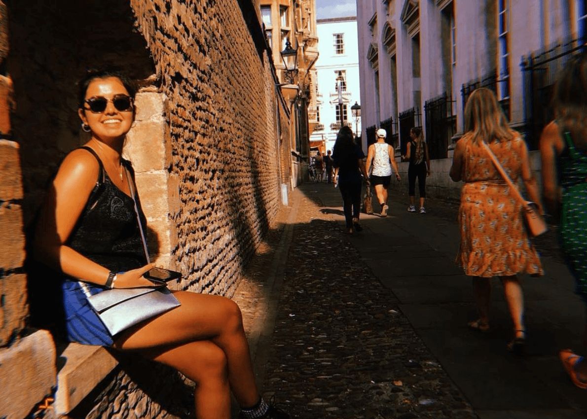 Image may contain: Skin, Woman, Sidewalk, Pavement, Shoe, Footwear, Female, Path, Walkway, Accessories, Accessory, Sunglasses, Clothing, Apparel, Human, Person