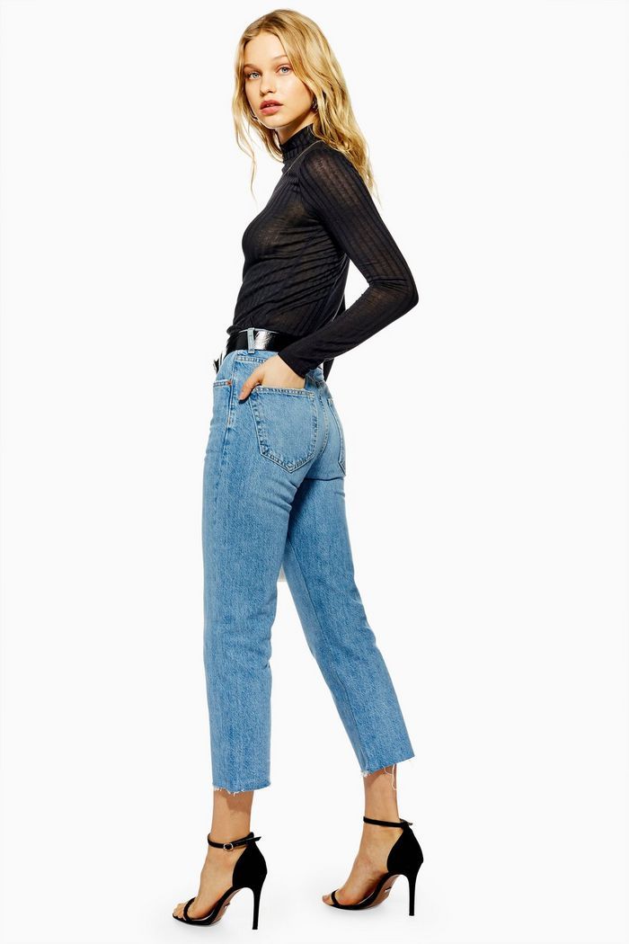 Image may contain: Overcoat, Suit, Coat, Woman, Female, Person, Human, Jeans, Denim, Clothing, Apparel, Pants