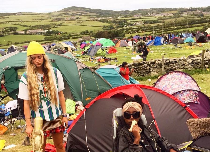 Image may contain: Crowd, Mountain Tent, Leisure Activities, Female, Clothing, Apparel, Face, Tent, Camping, Person, Human, Accessories, Sunglasses, Accessory, Building, Nature, Outdoors, Shelter, Countryside, Rural