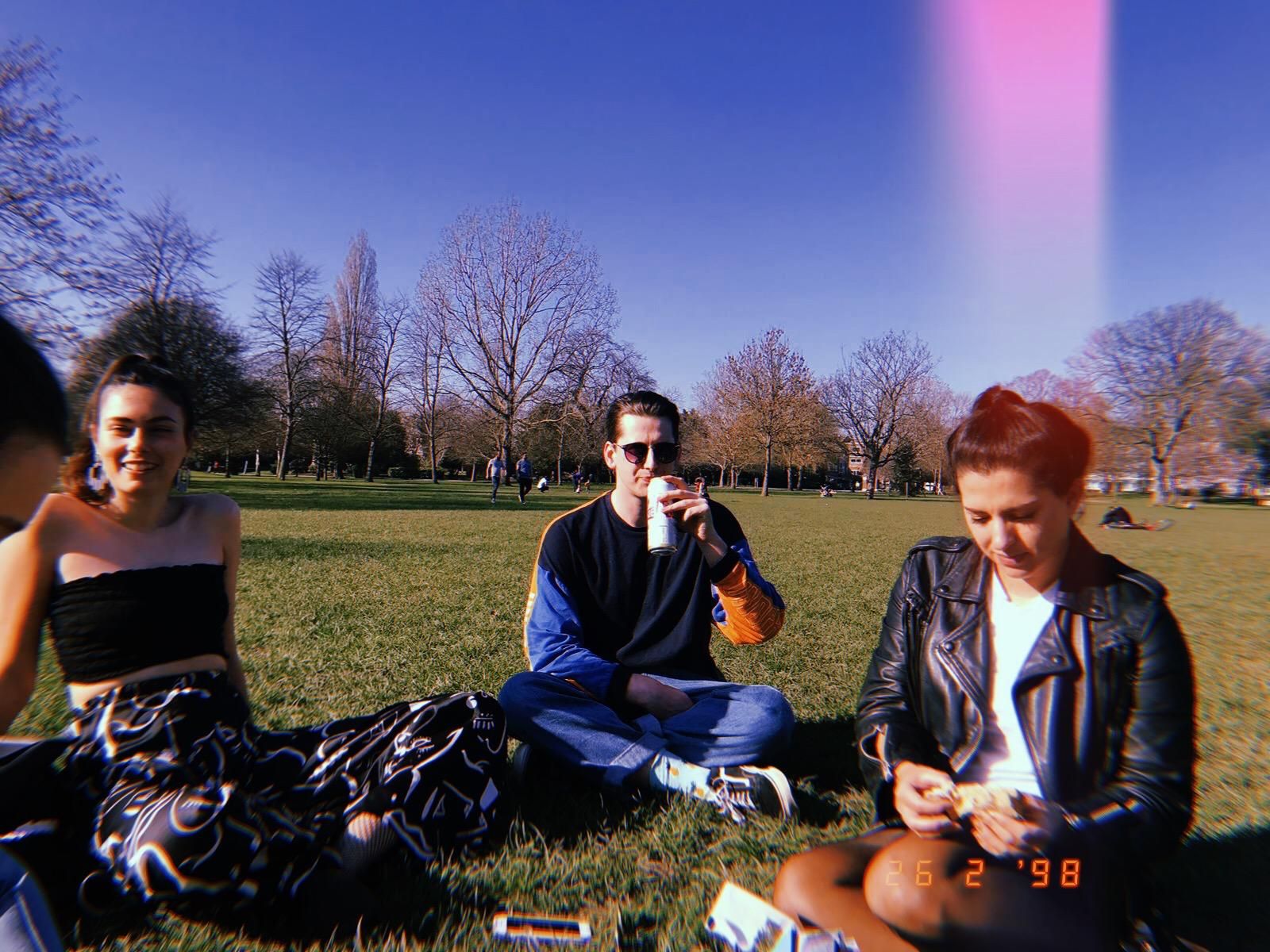 Image may contain: Dish, Jacket, Coat, Plant, Grass, Clothing, Apparel, Picnic, Leisure Activities, Sunglasses, Accessory, Accessories, Human, Person, Vacation, Meal, Food