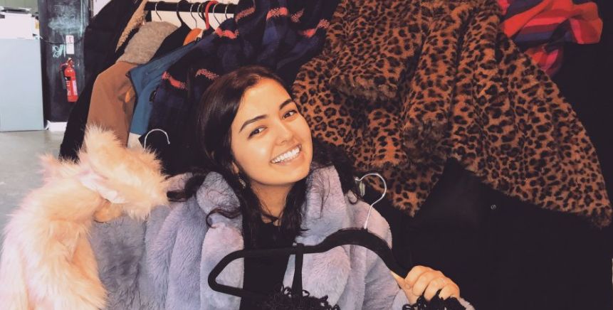 Image may contain: Indoors, Girl, Woman, People, Jacket, Coat, Photo, Photography, Portrait, Dog, Mammal, Pet, Canine, Animal, Blanket, Female, Pillow, Cushion, Smile, Clothing, Apparel, Person, Face, Human
