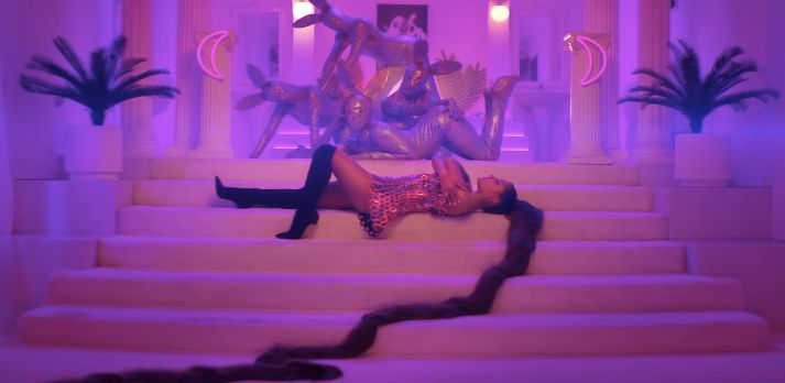 Image may contain: Ariana Grande blackfish, Ariana Grande, Leisure Activities, Acrobatic, Staircase, Human, Person
