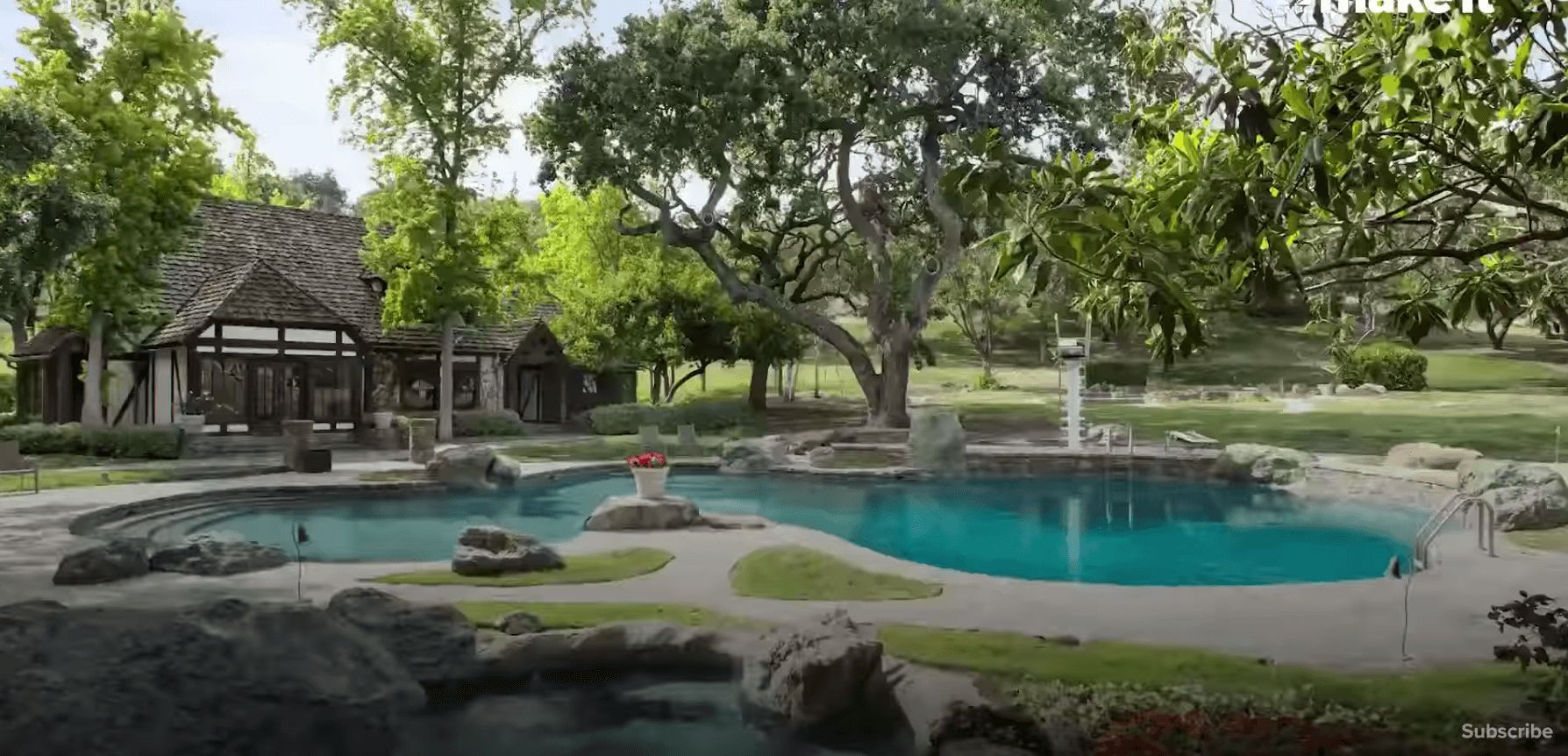 Image may contain: Neverland Ranch, Leaving Neverland, Lawn, Park, Swimming Pool, Forest, Woodland, Grove, Building, Garden, Tree, Grass, Land, Yard, Vegetation, Plant, Nature, Pool, Outdoors, Water