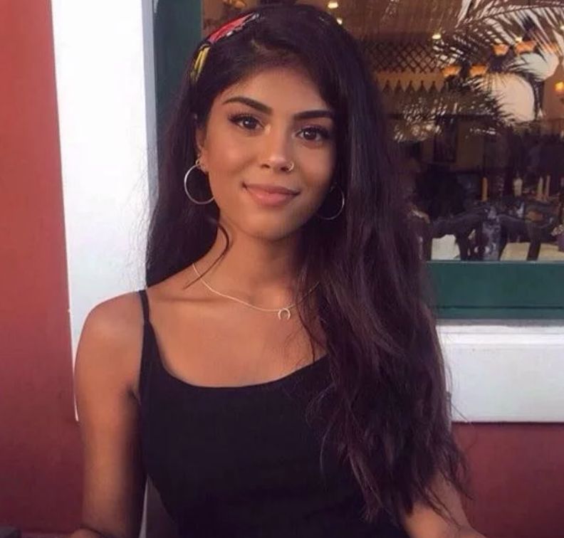 Image may contain: Photo, Photography, Portrait, Female, Smile, Person, Face, Human