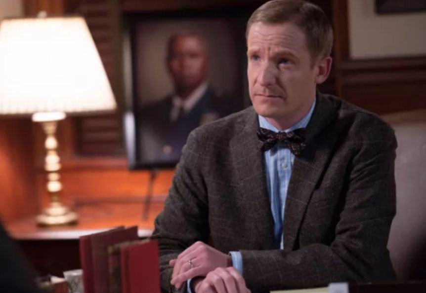 Image may contain: Court, Room, Indoors, Tie, Accessories, Accessory, Overcoat, Suit, Coat, Clothing, Apparel, Television, TV, Human, Person, Monitor, Display, Electronics, Screen, Lamp