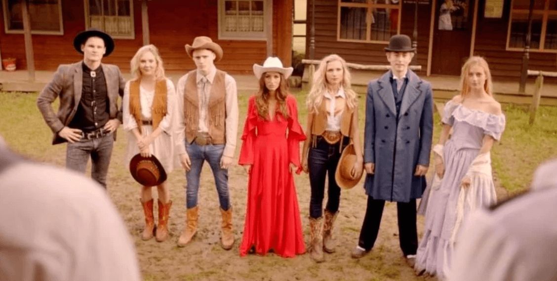 Image may contain: Made in Chelsea cast are actually from, Made in Chelsea, cast, from, birth place, hometowns, Sam Thompson, Louise Thompson, Digby, Miles, Olivia, Sophie, Toff, Melissa, Victoria, Hugo, Spencer, Binky, Ollie, Proudlock, Alex, Face, Hat, Overcoat, Coat, People, Pants, Costume, Dress, Clothing, Apparel, Girl, Teen, Woman, Female, Kid, Human, Blonde, Person, Child