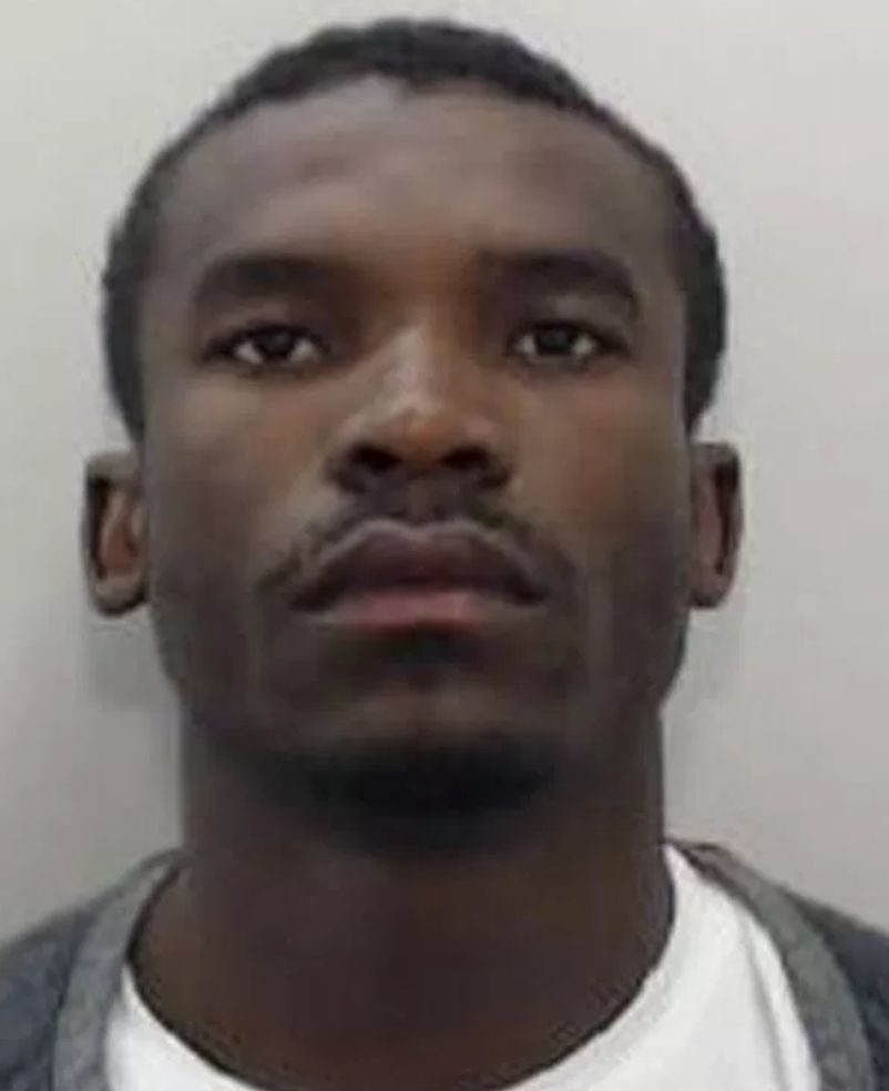 Image may contain: Georgia Steel, Medi Abalimba, boyfriend, conman, mugshot, fraud, news, Love island, Photography, Portrait, Photo, Beard, Man, Human, Face, Person
