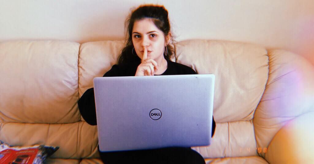 Image may contain: Pillow, Human, Person, Cushion, Couch, Furniture, Laptop, Pc, Electronics, Computer