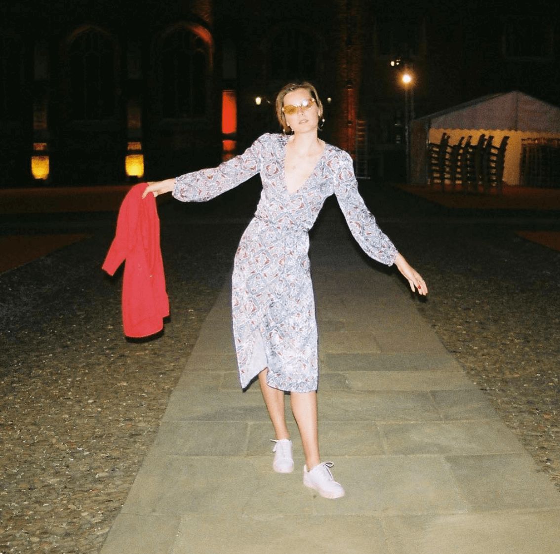 Image may contain: Emma Corrin, The Crown, Princess Diana, The Crown season 3, Princess of Wales, Instagram, actress, cast, The Crown season 4, Runway, Human, Person, Gown, Fashion, Evening Dress, Robe, Long Sleeve, Sleeve, Clothing, Apparel