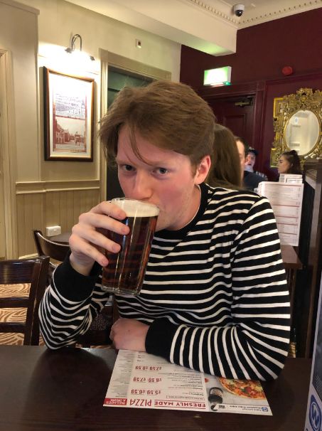 Image may contain: Bar Counter, Face, Stout, Furniture, Pub, Glass, Indoors, Interior Design, Cafe, Alcohol, Beer, Drinking, Dating, Drink, Beverage, Restaurant, Person, Human