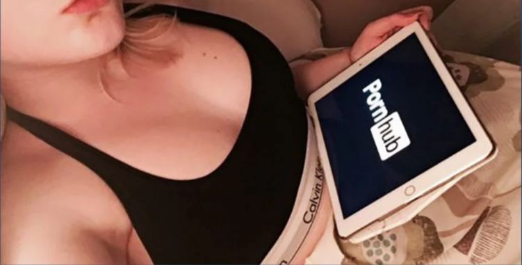 Image may contain: how to use sex toys, Clothing, Apparel, Face, Tablet Computer, Computer, Electronics, Human, Person
