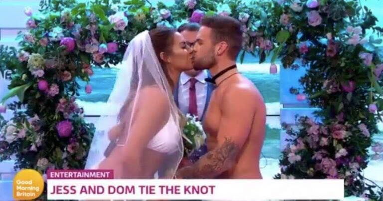 Image may contain: Jess Shears pregnant, Jessica Shears, Dom Lever, baby, pregnant, Love Island, 2017,  Flower Bouquet, Flower Arrangement, Wedding Gown, Bridegroom, Wedding, Gown, Vegetation, Petal, Fashion, Robe, Kiss, Kissing, Flower, Blossom, Plant, Person, Human, Clothing, Apparel