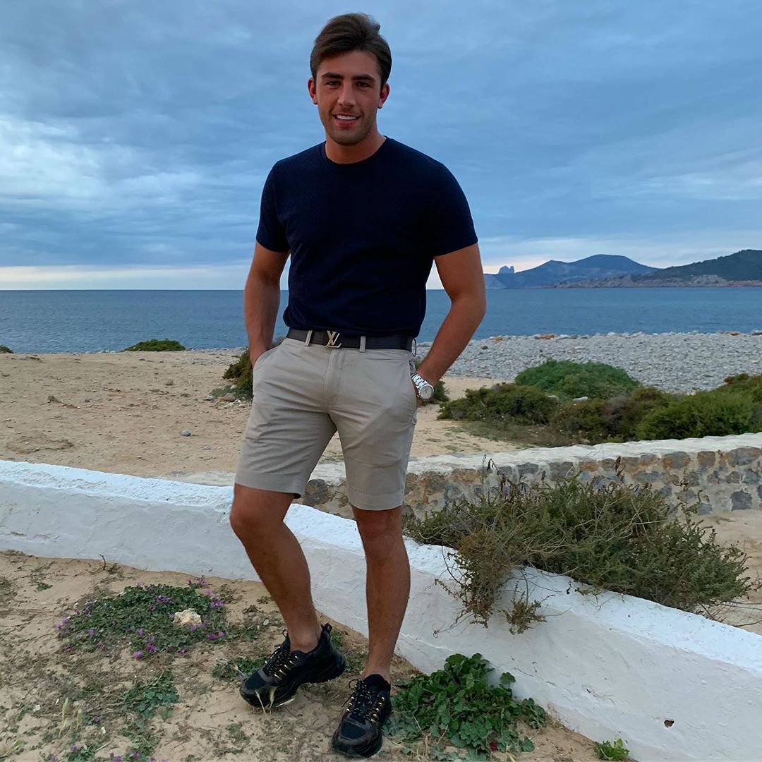 Image may contain: Celebs Go Dating cast, Celebs Go Dating, 2019, Jack Fincham, start date, how to apply, lineup, cast, Outdoors, Soil, Footwear, Shoe, Person, Human, Clothing, Shorts, Apparel