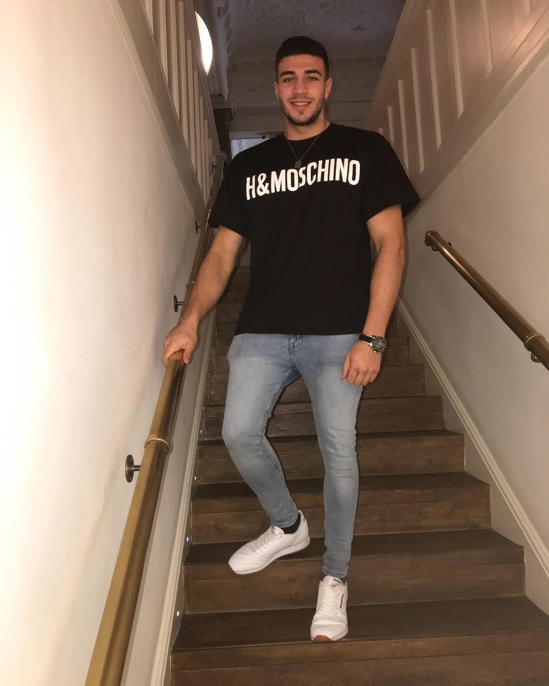 Image may contain: Tommy Fury, Love Island, 2019, Tyson Fury, brother, cast, lineup, rumoured contestant, Shane Fury, Pants, Staircase, Sleeve, Plywood, Footwear, Shoe, Wood, Apparel, Clothing, Person, Human, Banister, Handrail