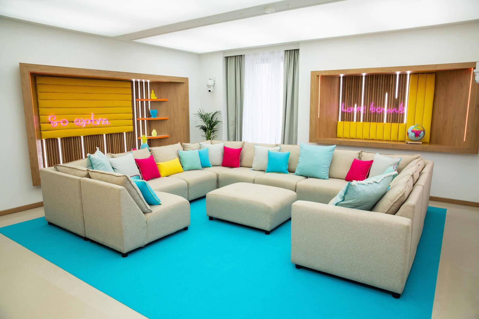 Image may contain: Love Island villa, Sant Llorenç des Cardassar, Love Island, villa, location, 2019, pictures, inside, first look, Pillow, Coffee Table, Cushion, Rug, Interior Design, Table, Living Room, Indoors, Room, Couch, Furniture