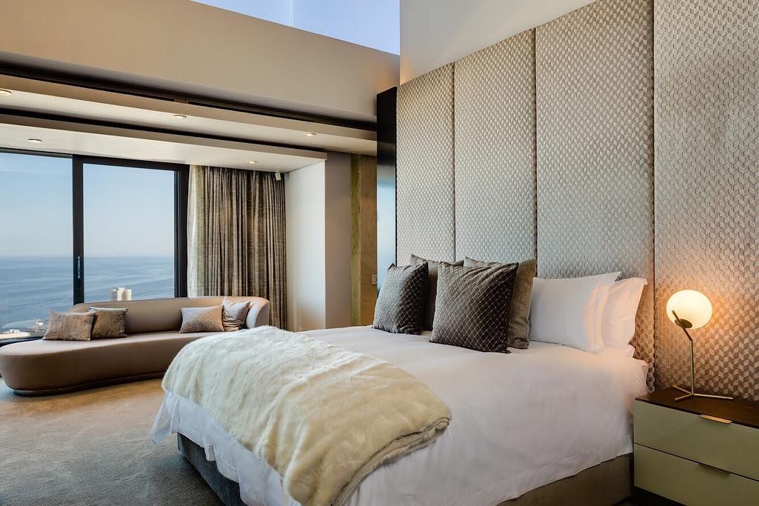 Image may contain: Moondance Villa, Made in Chelsea, MIC, Cape Town, South Africa, Inside, cost, Instagram, book, Pillow, Dorm Room, Cushion, Building, Housing, Interior Design, Home Decor, Couch, Indoors, Room, Bedroom, Furniture, Bed