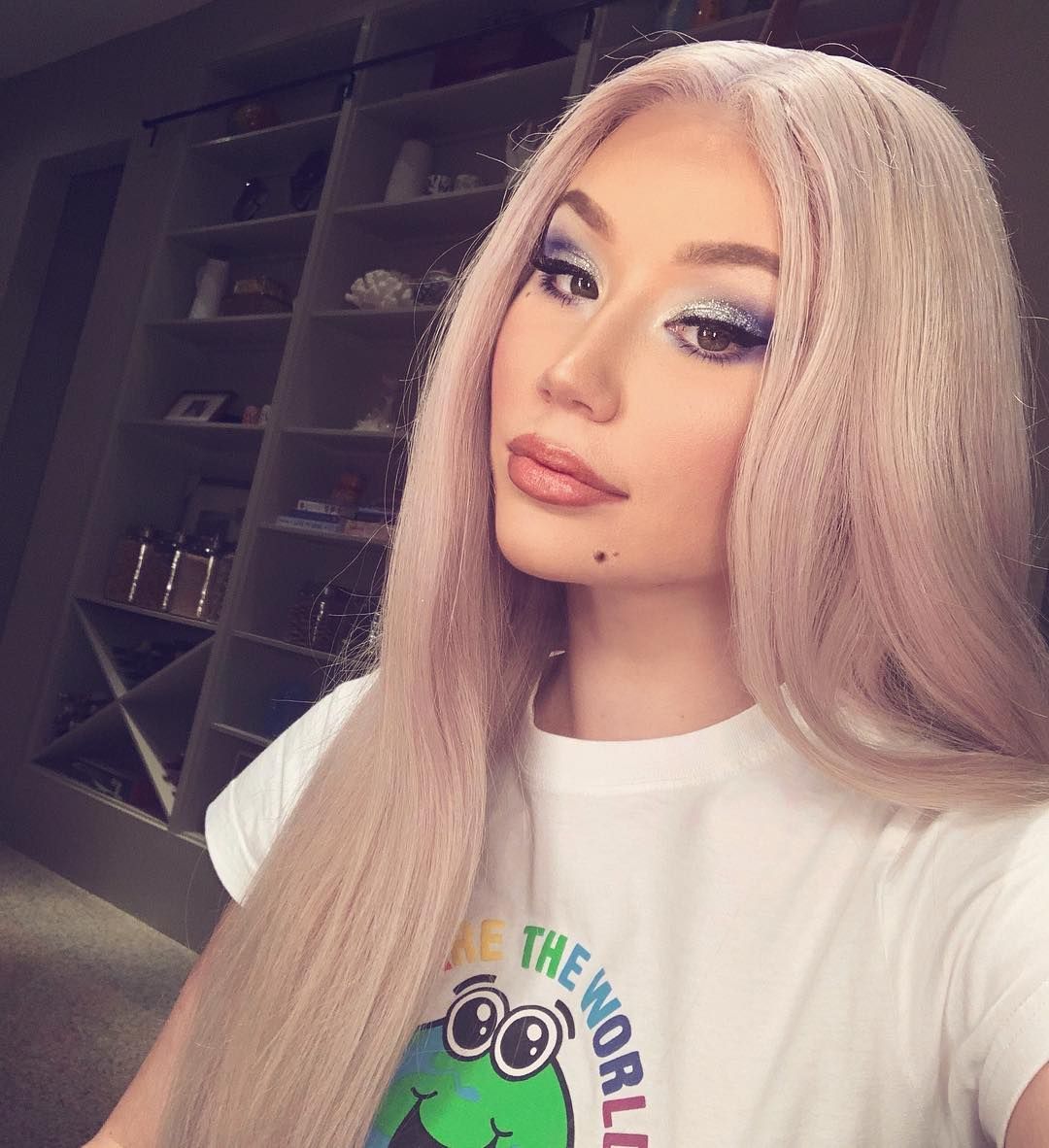 Image may contain: Celebrities who unfollowed James Charles, James Charles, Iggy Azalea, Tati Westbrook, unfollowed, celebs, celebrity, YouTube, tea, feud, Instagram, Portrait, Photography, Photo, Furniture, Hair, Woman, Girl, Blonde, Child, Teen, Kid, Female, Human, Person, Face